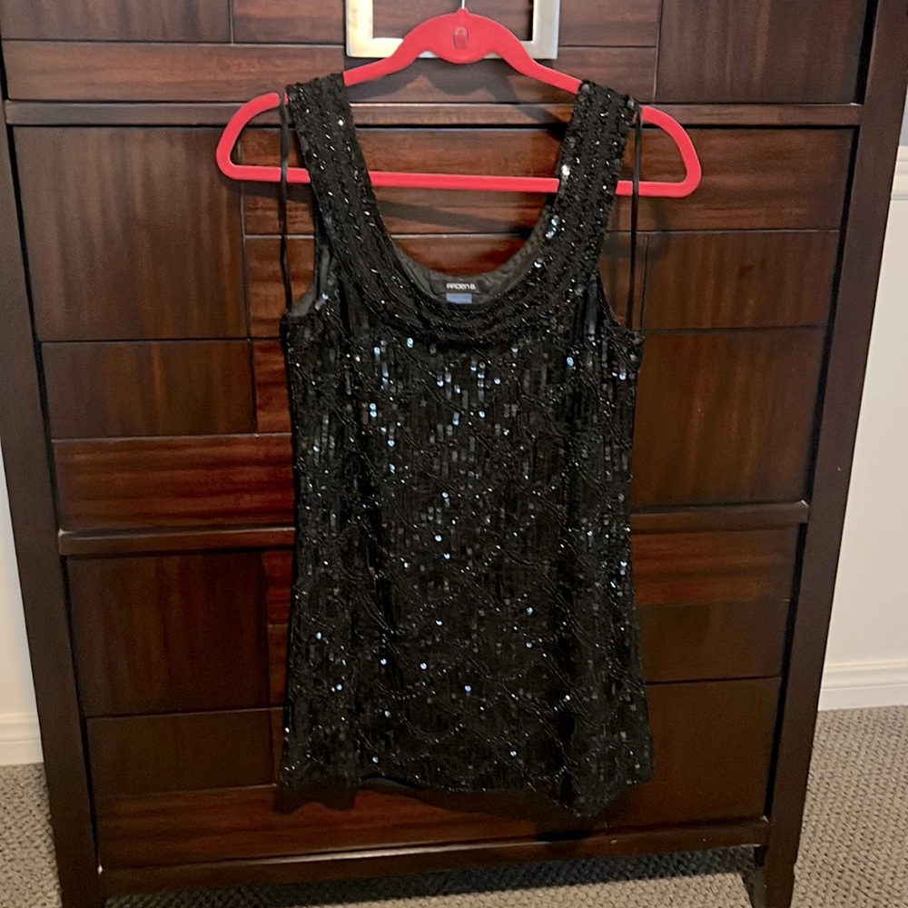 Black sequins top with a lot of details from Arden B